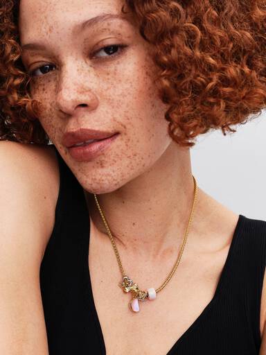 Charm colgante Luna creciente reluciente