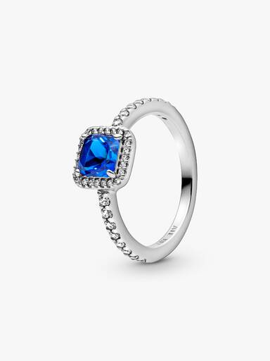Anillo cuadrado azul con halo brillante