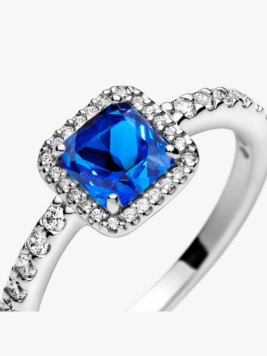 Anillo cuadrado azul con halo brillante