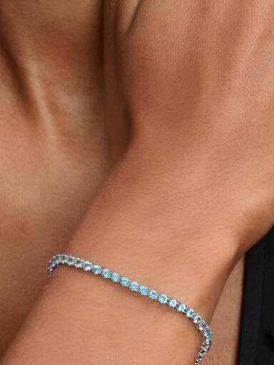 Brazalete de tenis azul claro reluciente
