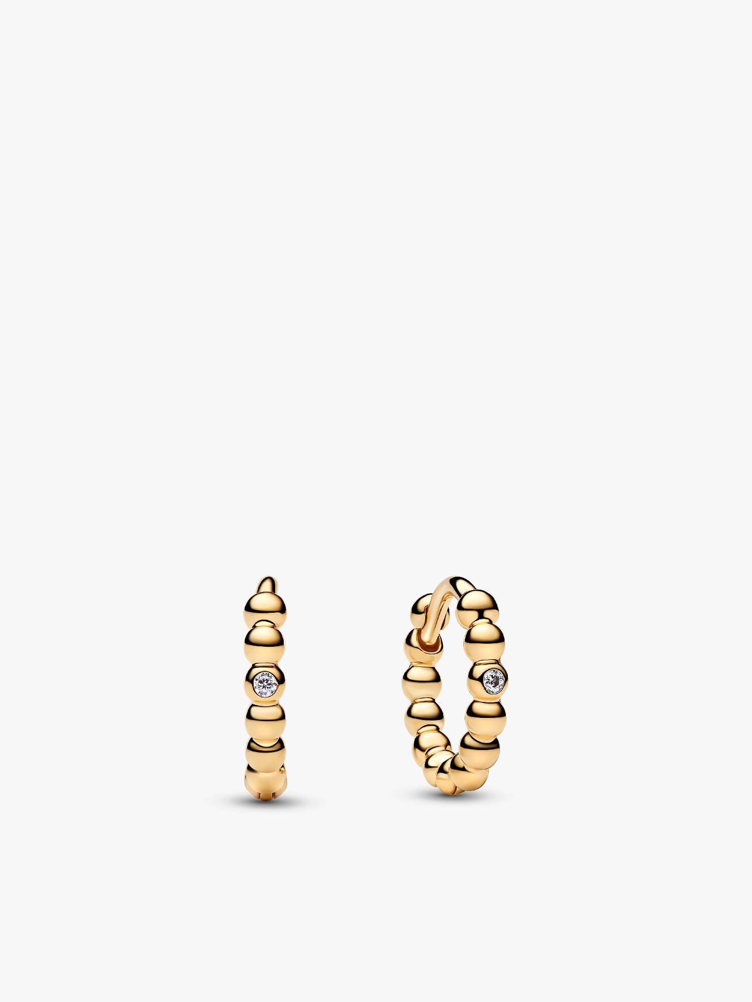 Aretes Huggie con cuentas