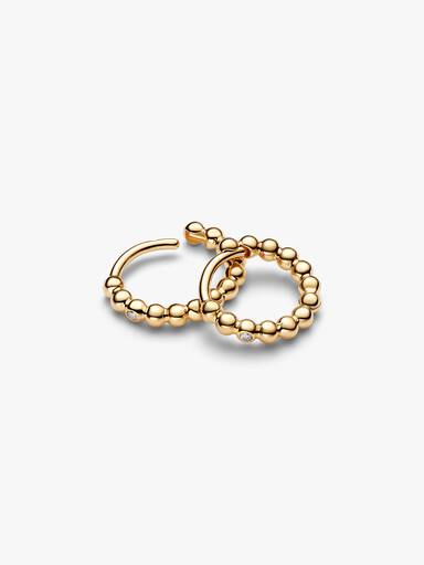 Aretes Huggie con cuentas