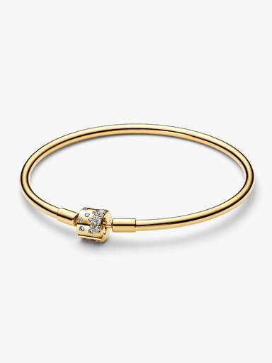 Brazalete dorado con cierre de barril brillante