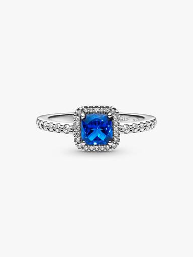 Anillo cuadrado azul con halo brillante