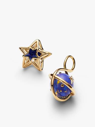 Dúo de charms de estrella y planeta dorados
