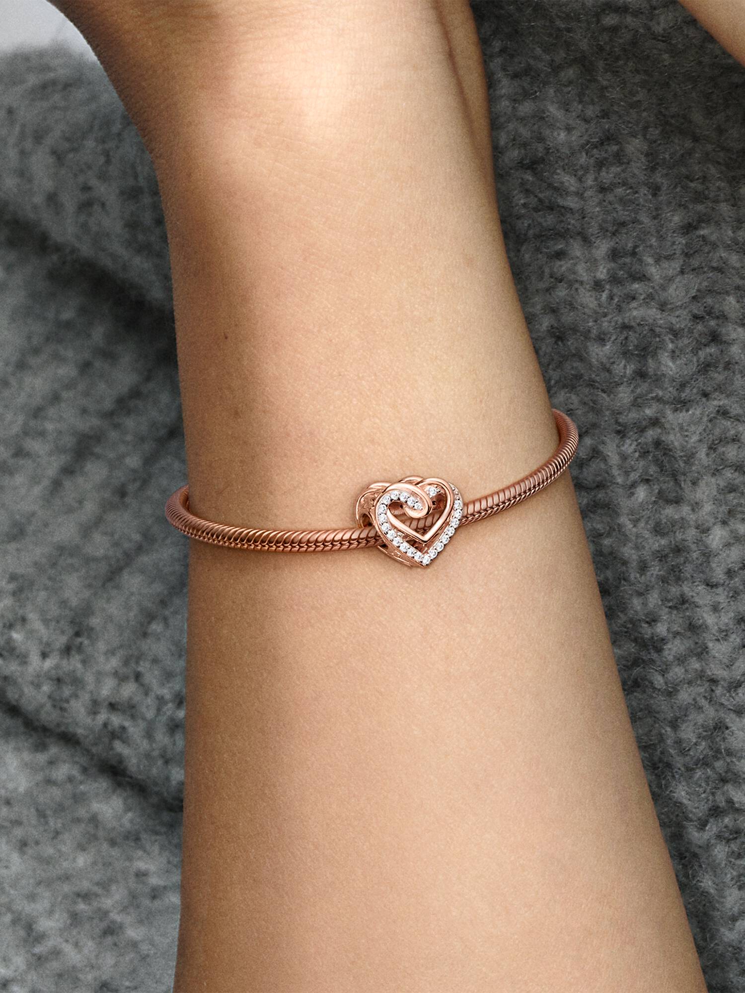 Charm Corazones entrelazados resplandecientes