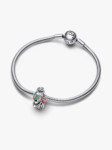 Charm Calavera que brilla en la oscuridad con Miguel y Dante de Coco de Disney Pixar