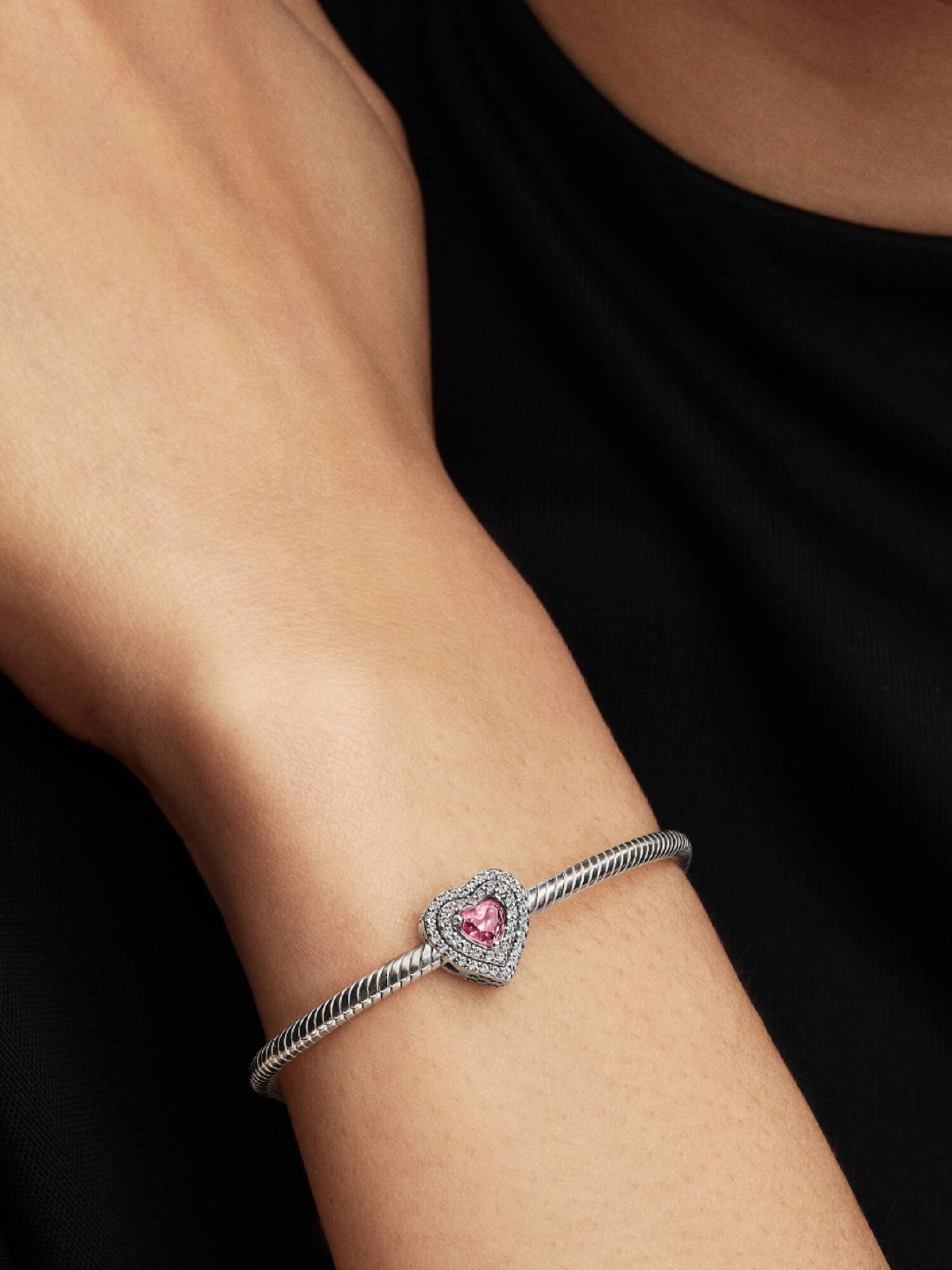 Charm Corazones relucientes en niveles